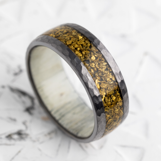 7 mm wide/Domed/Tantalum band with one 4 mm Centered inlay of Alaskan Gold Nugget.